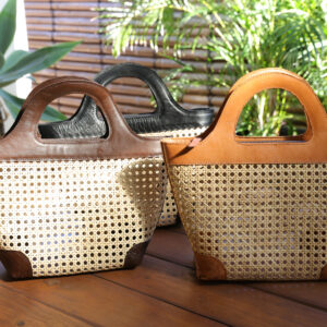 Woven rattan bag with leather detail