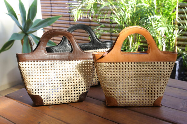 Woven rattan bag with leather detail